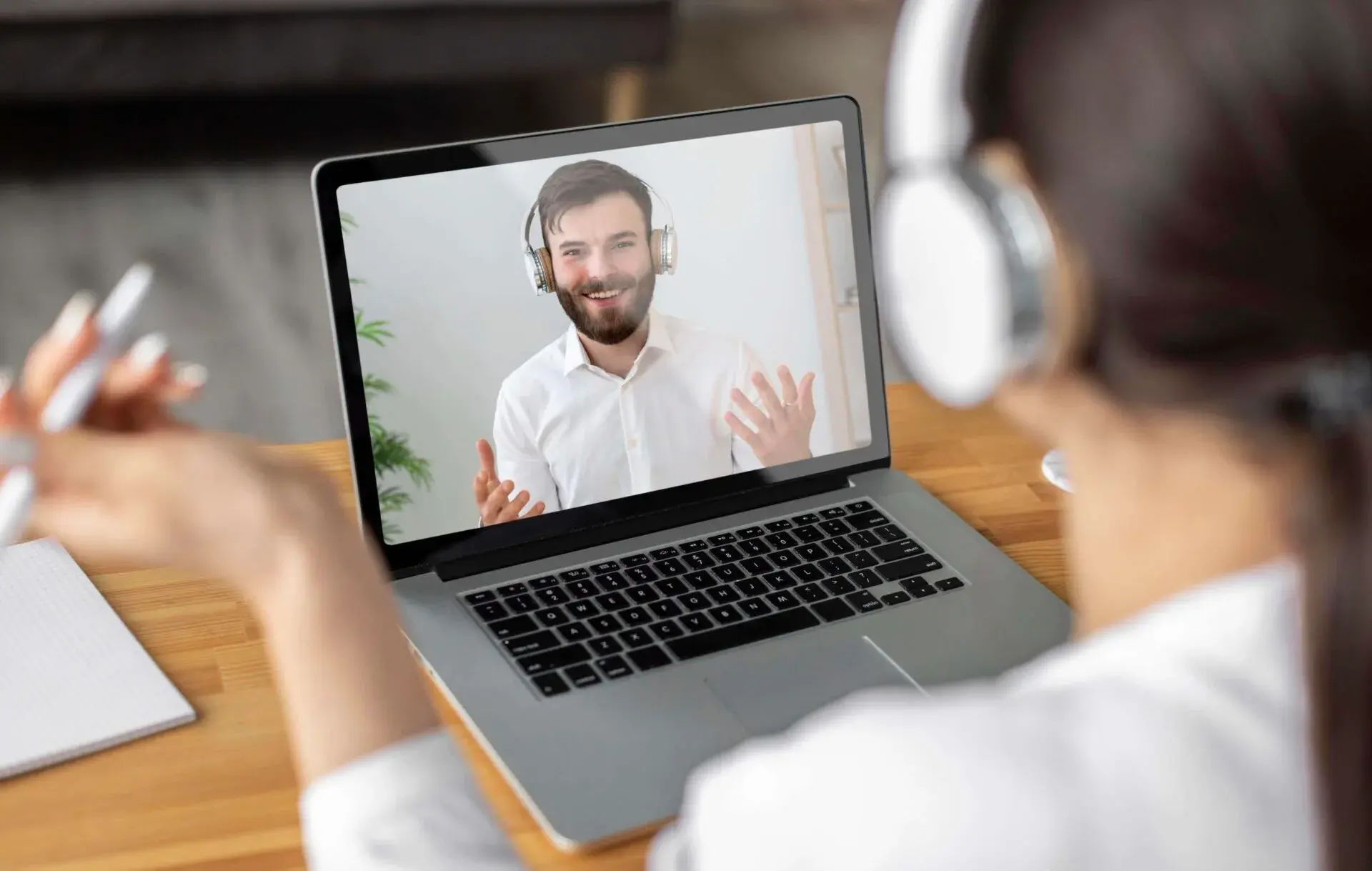 Illustration of woman video calling employee
